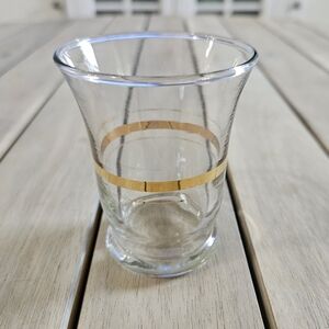 Vintage shot glass, specifically the Anchor Hocking Triple Gold Band